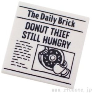2x2タイル（ニュースペーパー・The Daily Brick' and 'DONUT THIEF STILL HUNGRY）